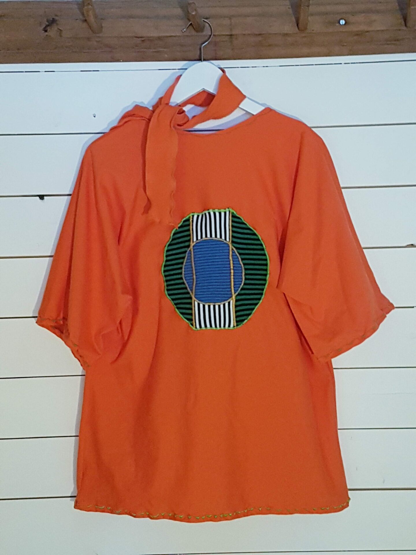 Go Dressed in Lapland Art- T-shirt Föträndra Orangea bak